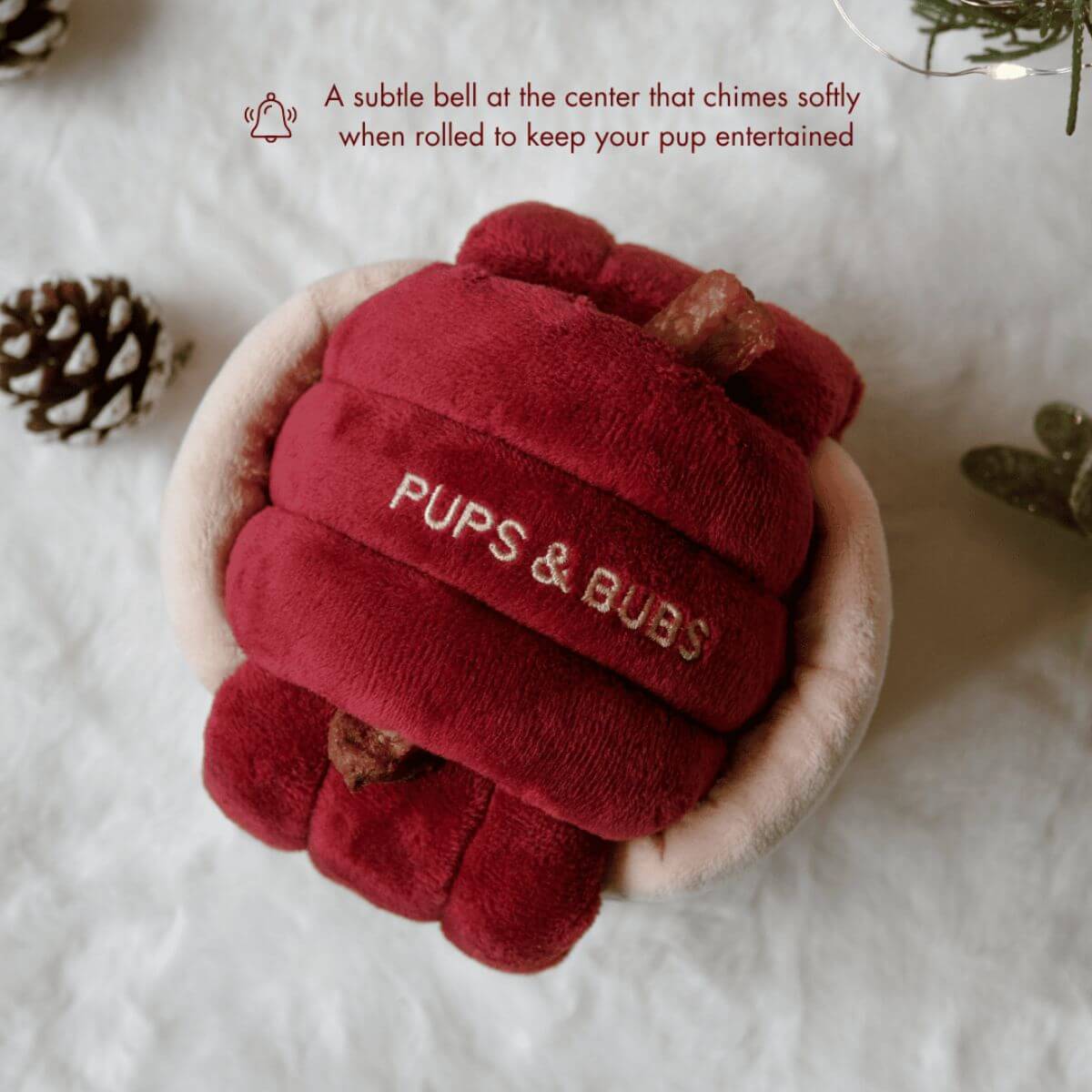 A graphic with copy describing how the bell chimes when tossed or rolled for the Pups and Bubs Jingle Know Nosework Toy.