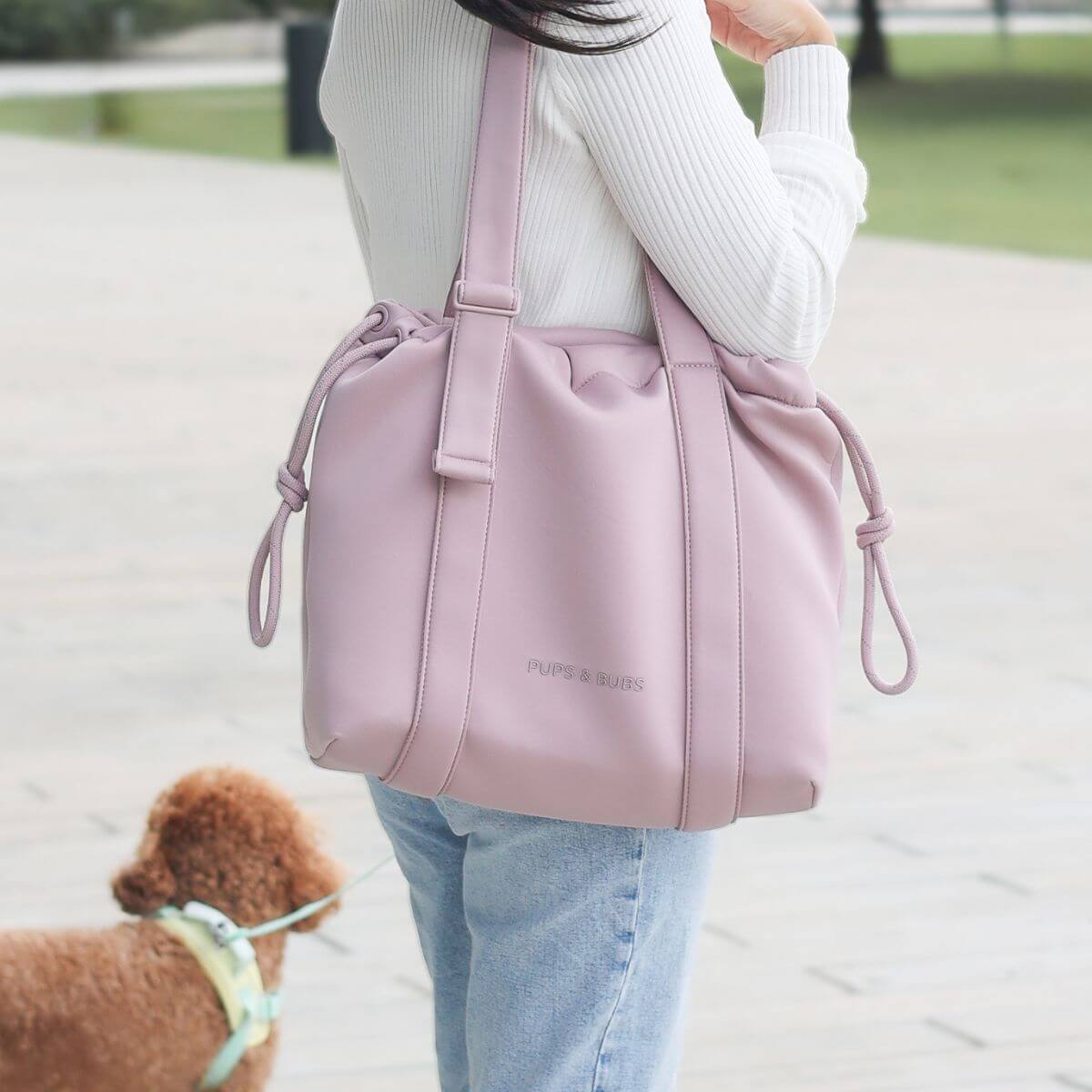 Pups and Bubs All Day Chill Bag in Rose outdoors.
