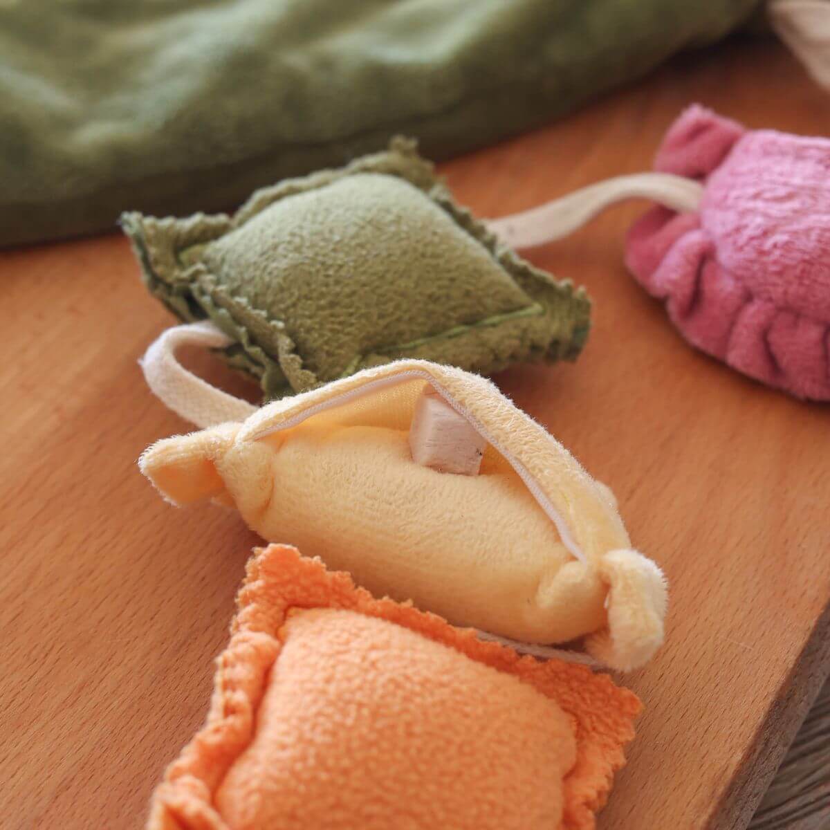 Close-up shot of the Pups and Bubs Ravioli Nosework Toy showcasing the hidden treat pockets.