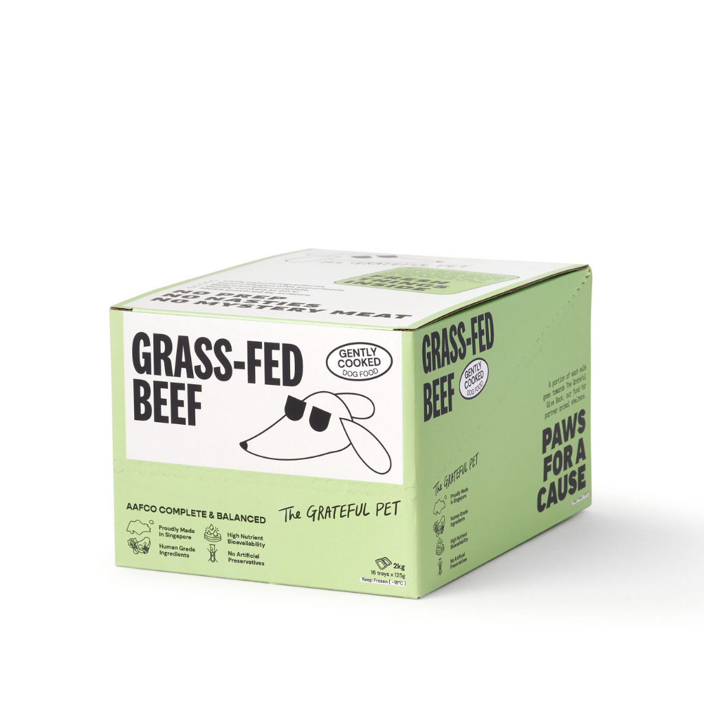 Box of grass-fed beef for pets with branding and text on a white background