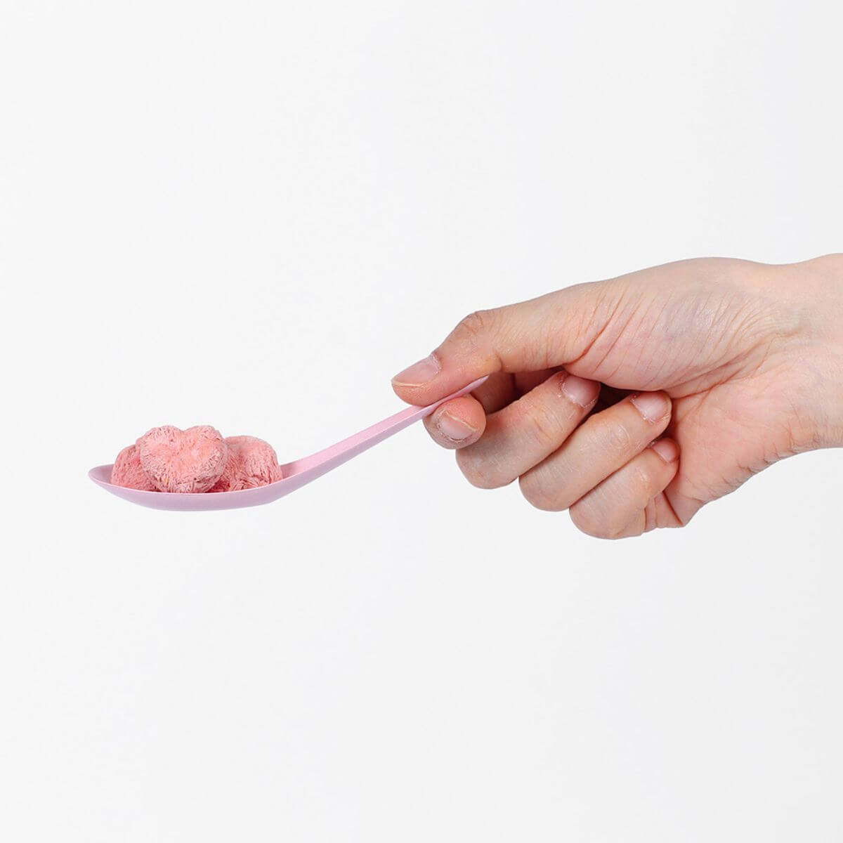 Arlo Kitchen Oneday Yogurt Strawberry and Beet against a white background, on a spoon.