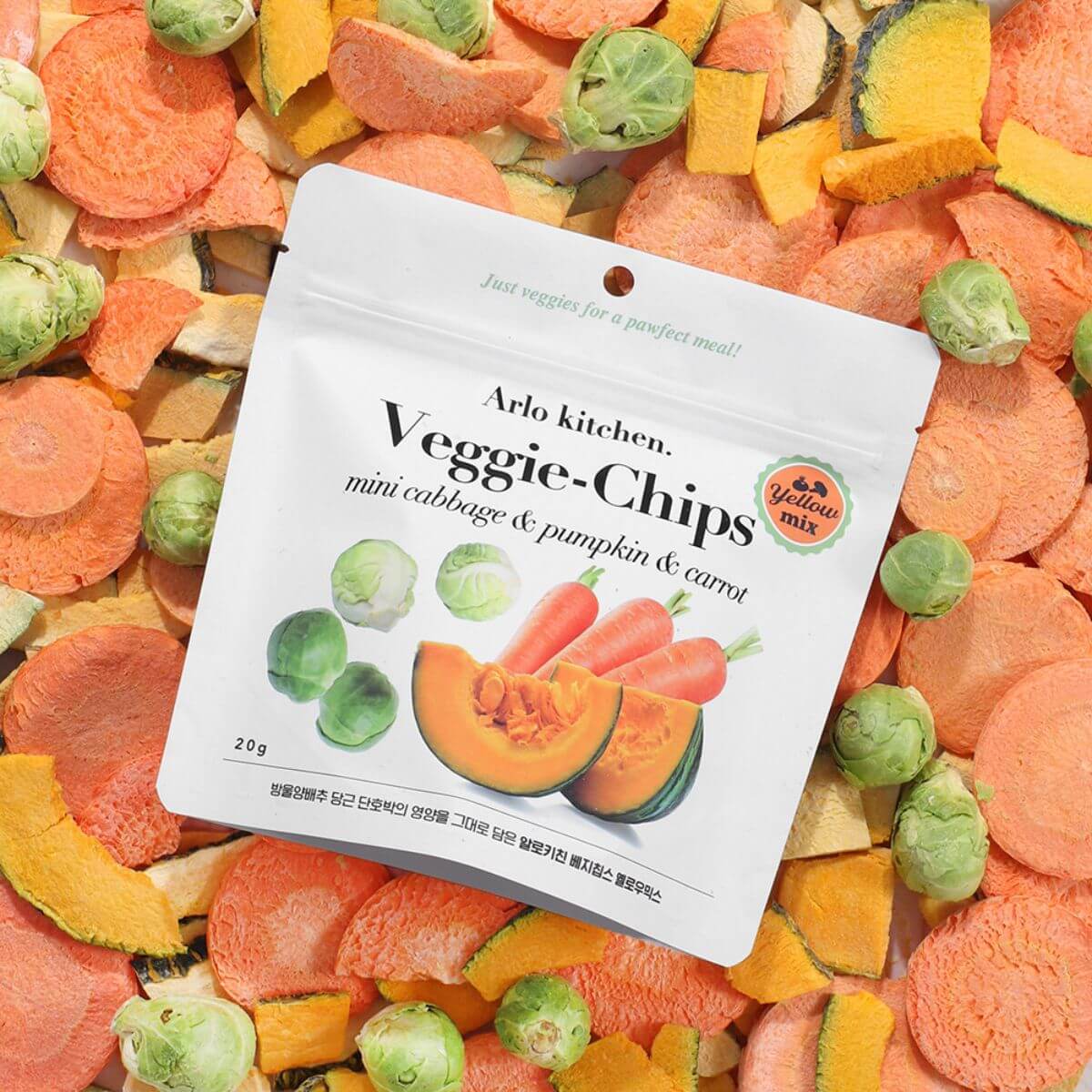 Arlo Kitchen Veggie Chips Mix against all the vegetables in the background.
