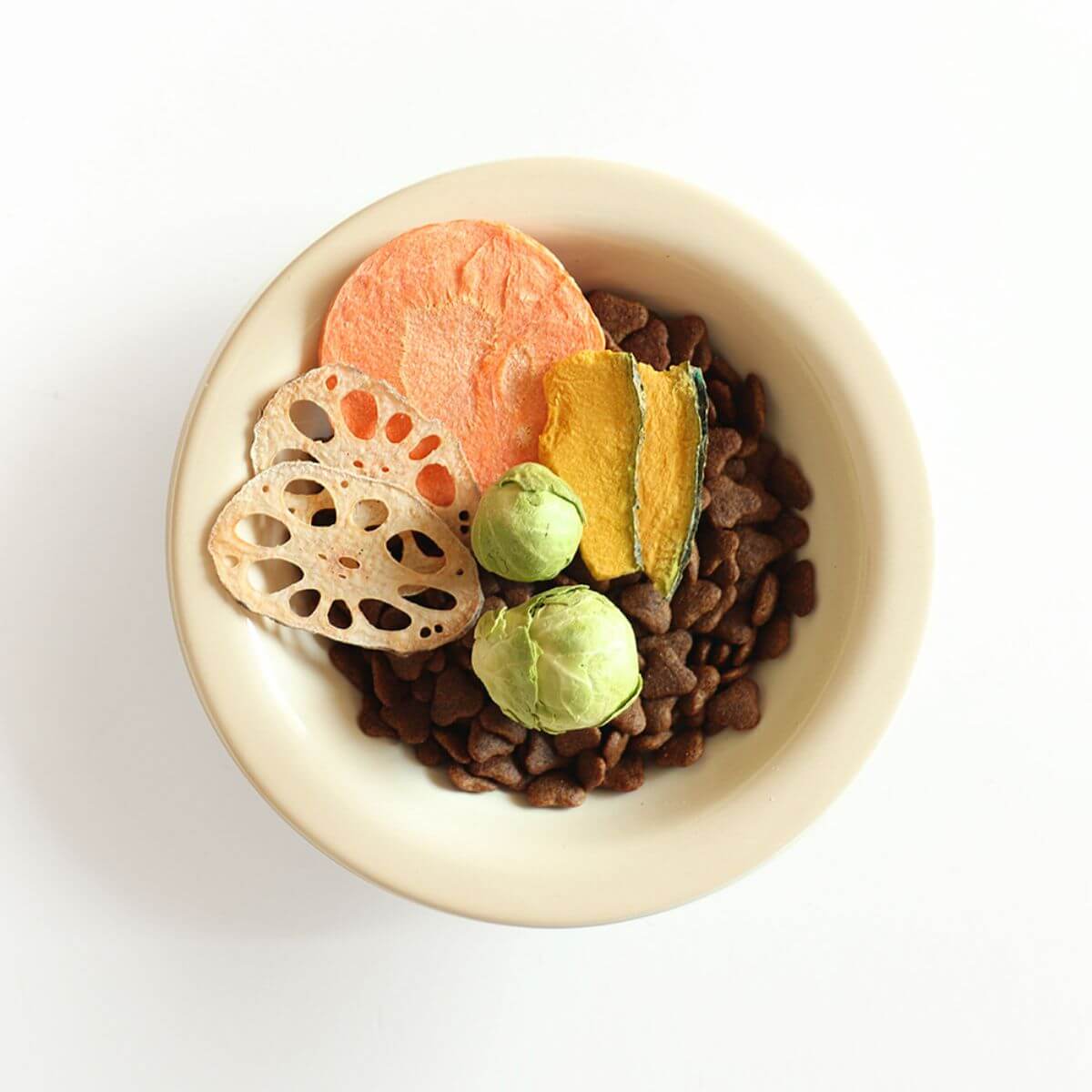 Arlo Kitchen Veggie Chips Organic Lotus Root against a white background in a bowl.