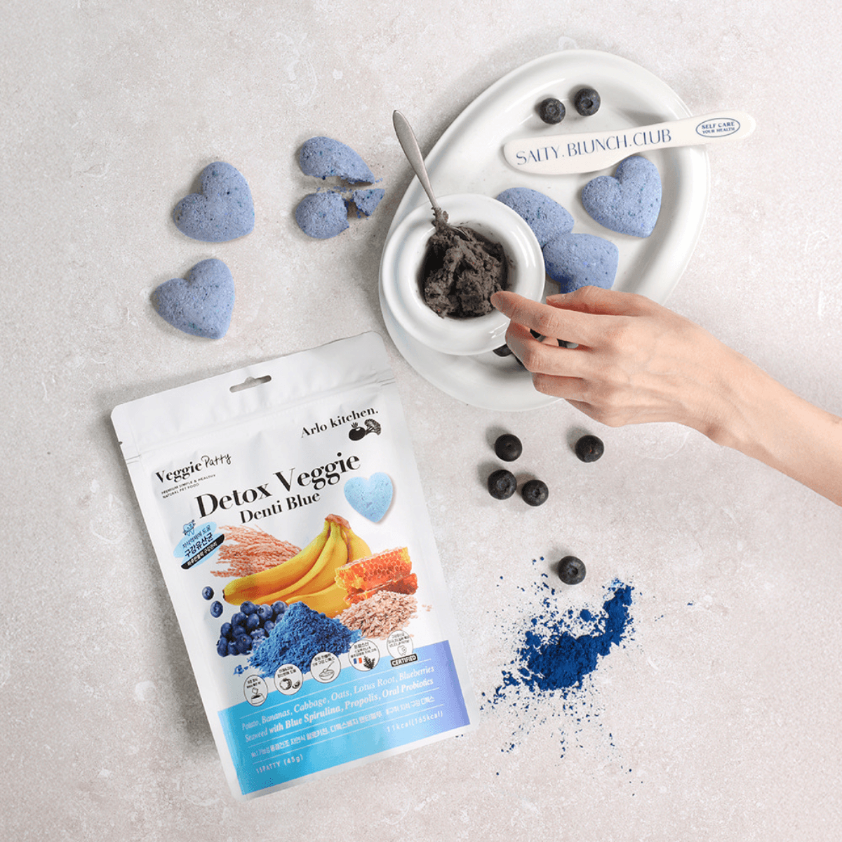 Arlo Kitchen Veggie Detox Denti Blue grinded into powder as a food topper.