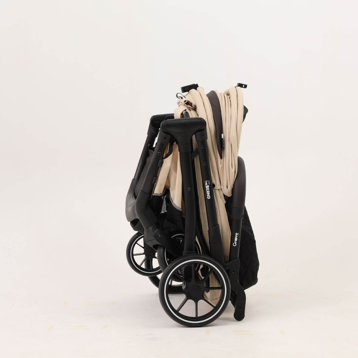 Bernd Pets Autofold Groove Pet Stroller in Latte Beige against a white background.