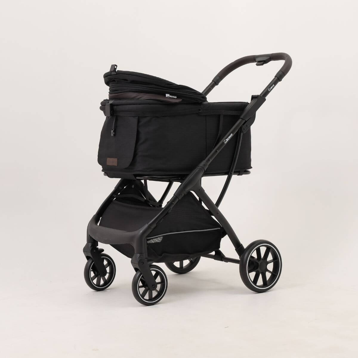 Bernd Pets Autofold Groove Pet Stroller in Onyx Black against a white background.