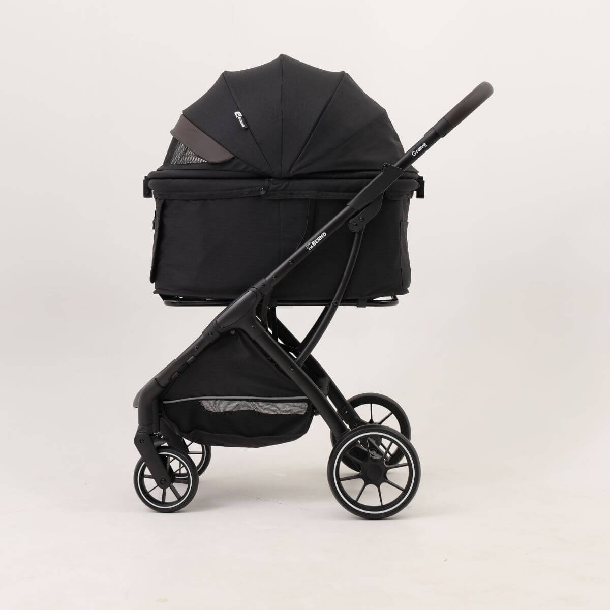 Bernd Pets Autofold Groove Pet Stroller in Onyx Black against a white background.