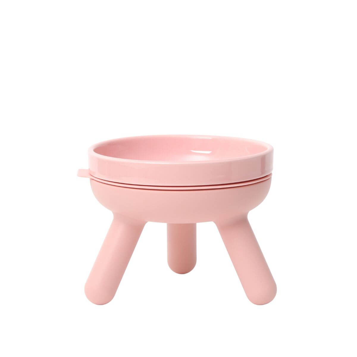 inherent outdoor oreo table in baby pink against a white background.