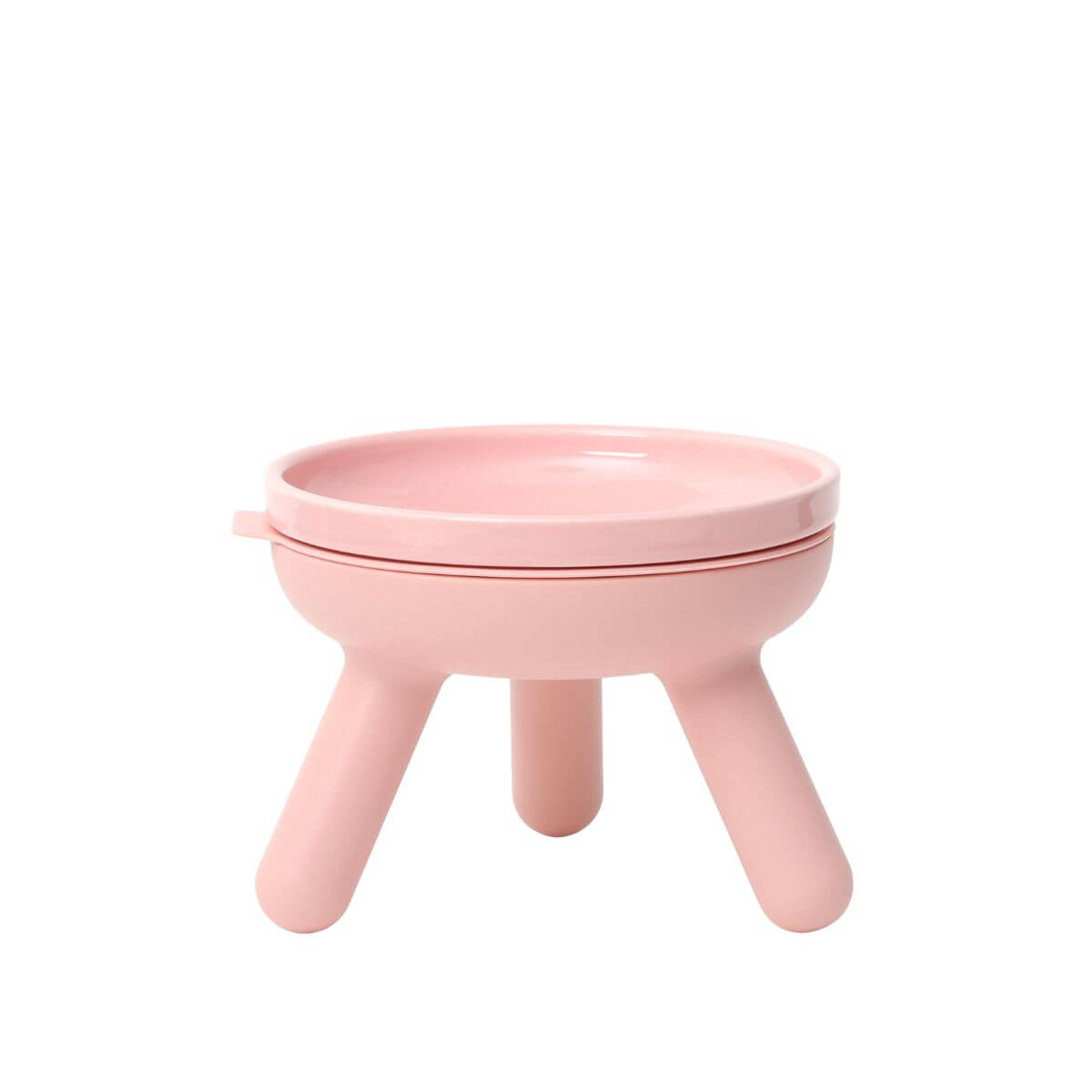 inherent outdoor oreo table in baby pink against a white background.