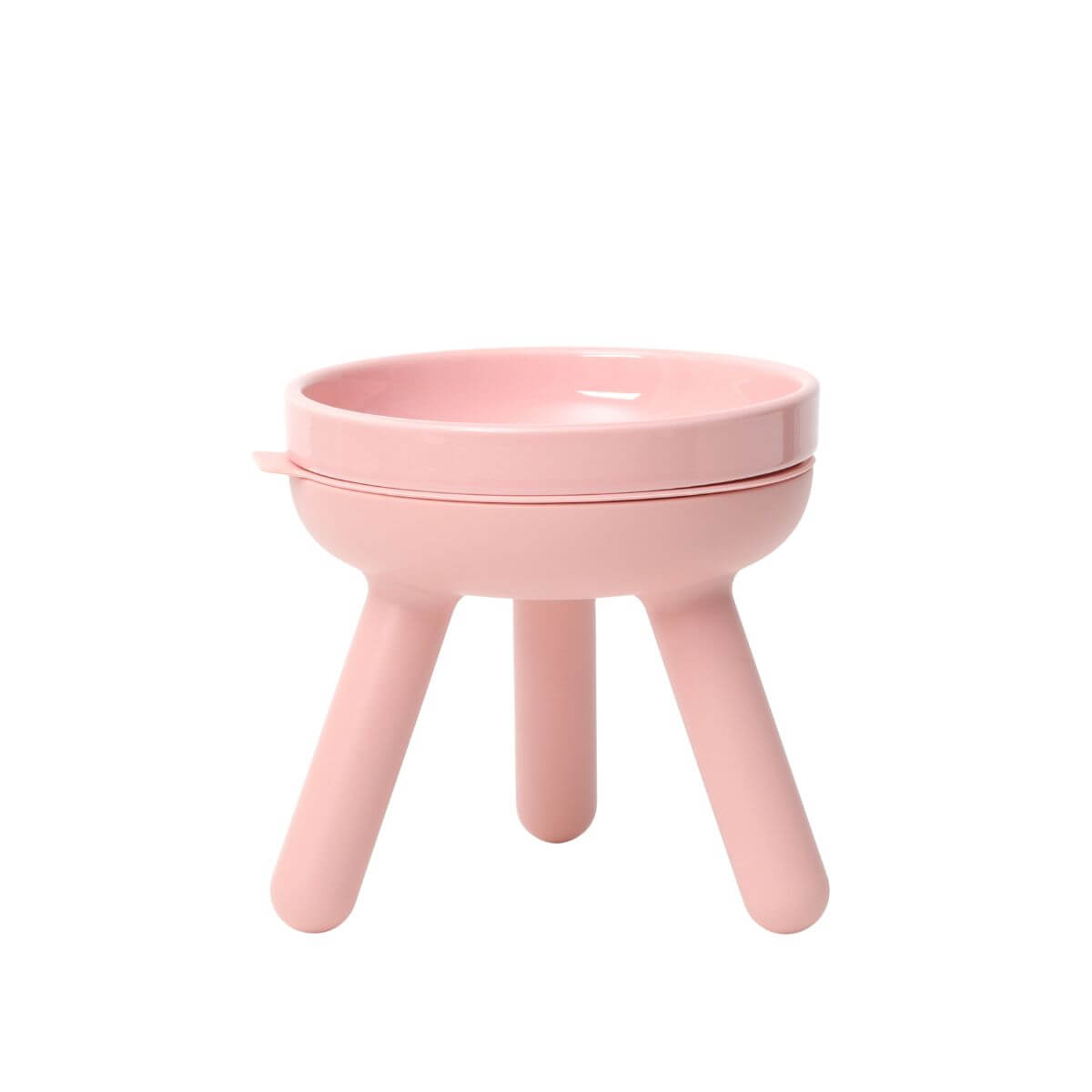 inherent outdoor oreo table in baby pink against a white background.