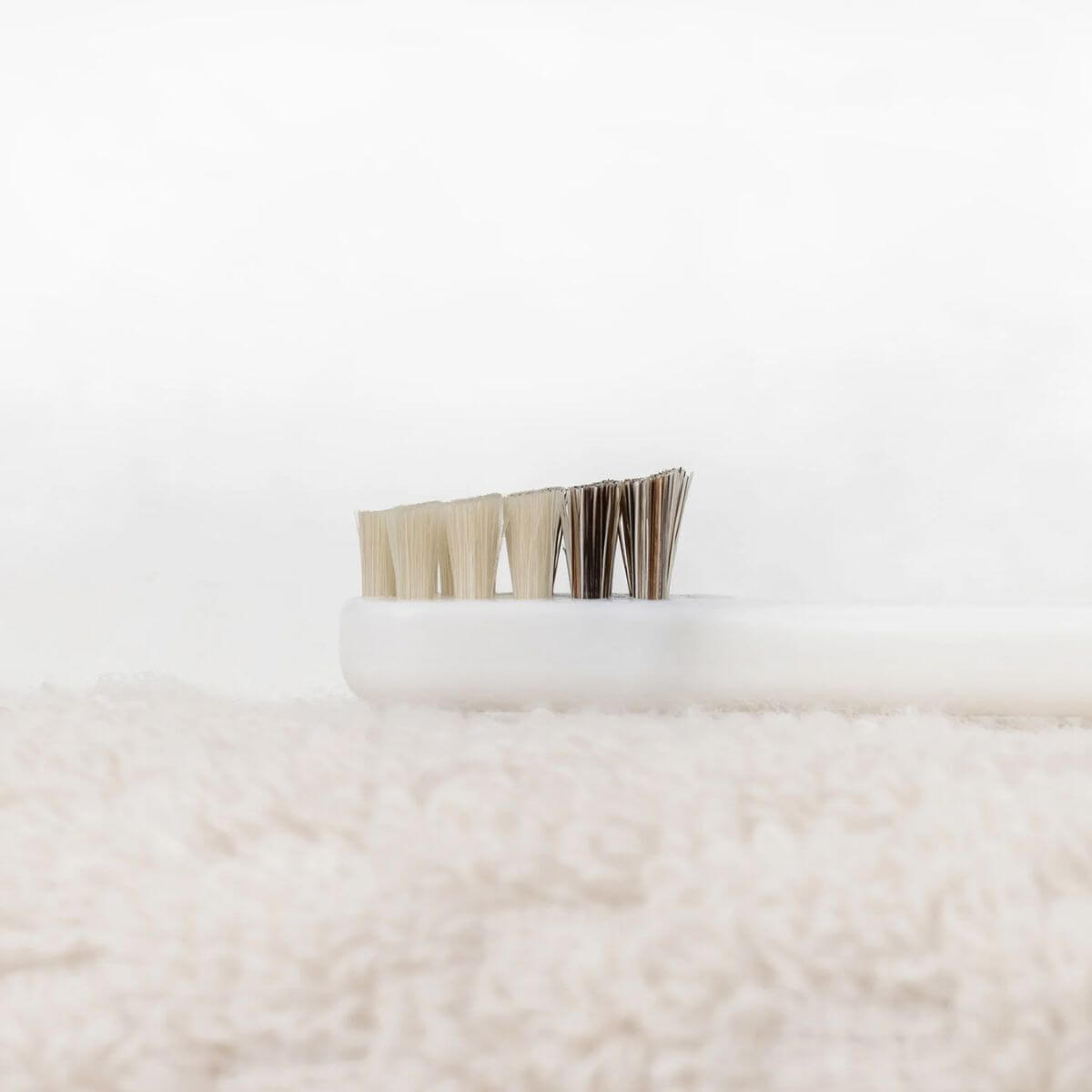 MIGAKENDE Goat and Horse Hair Slanted Toothbrush against a white background.
