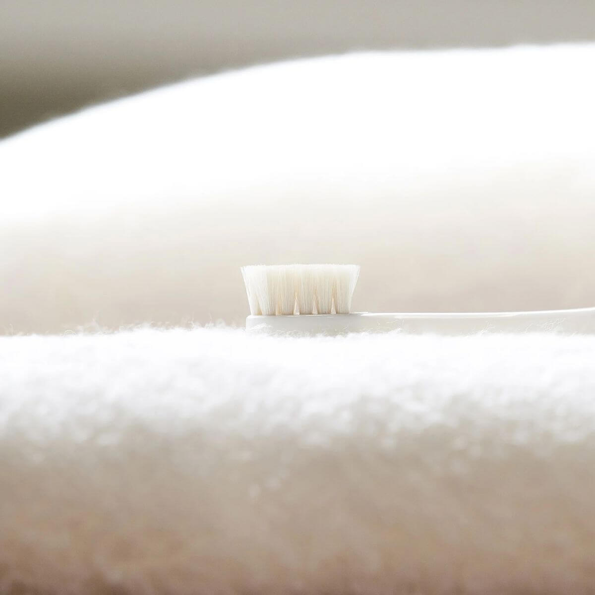 MIGAKENDE Goat Hair Bristle Toothbrush against a white background.