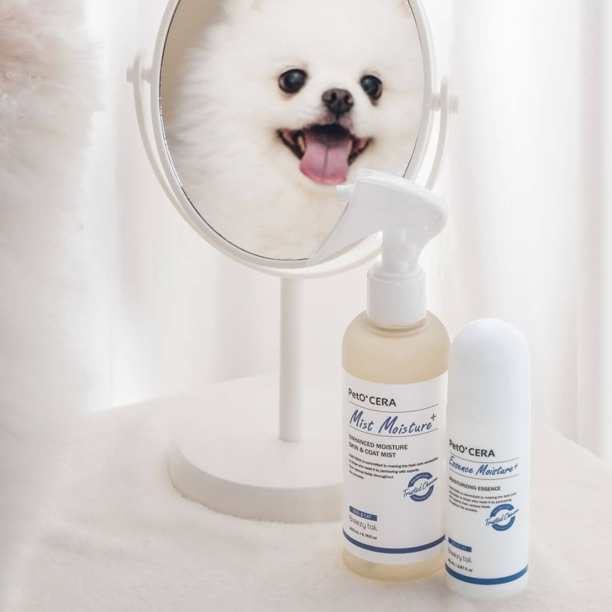 PetO'CERA Mist Moisture Plus, Essence Moisture, and a white pomeranian.
