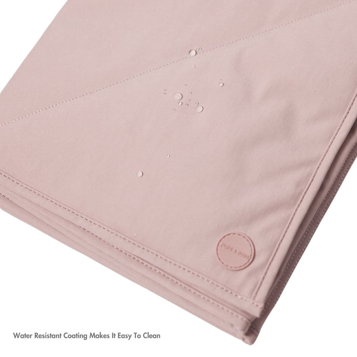 Pups & Bubs Jouir Travel Mat against a white background.