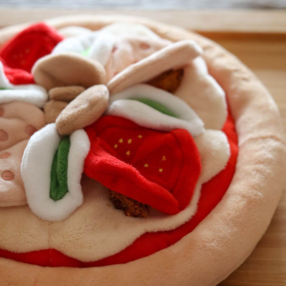 Pups & Bubs Pepperoni Pizza Snuffle Mat from the side view, close up.