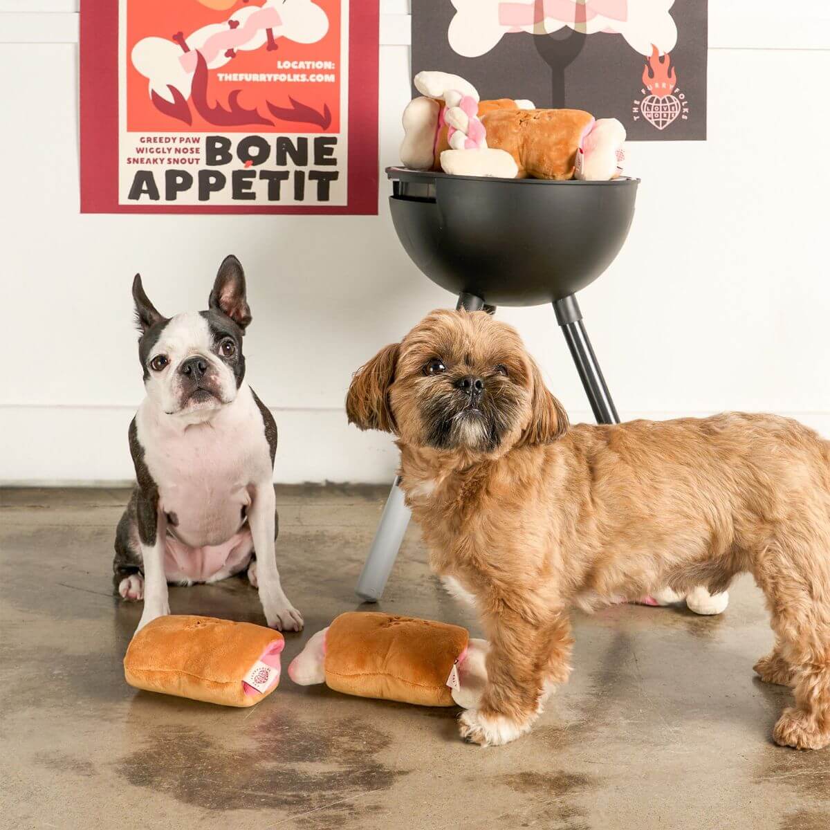 two dogs with the the furryfolks bone appetit nosework toy.