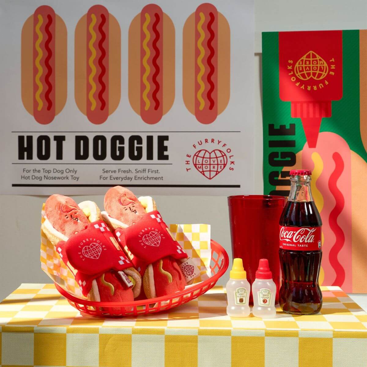 the furryfolks hot doggie nosework toy in a food basket at a hot dog stand.