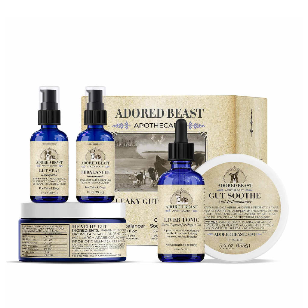 Collection of Adored Beast Apothecary products including bottles and a box on a white background.