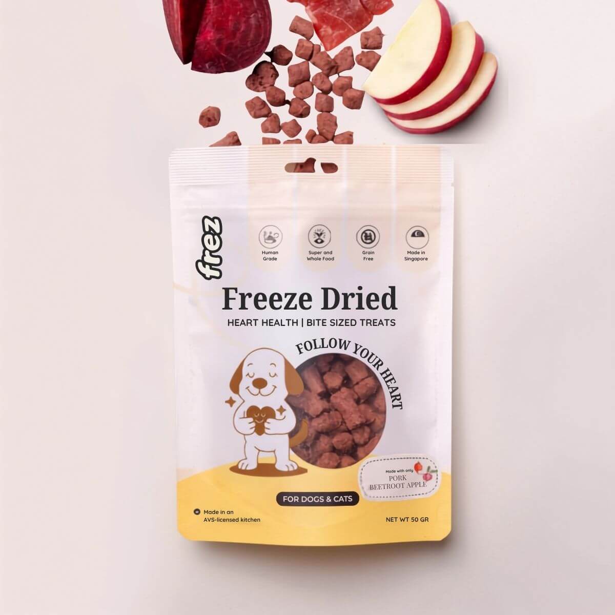 frez pork, beetroot, and apple treats against a white background.