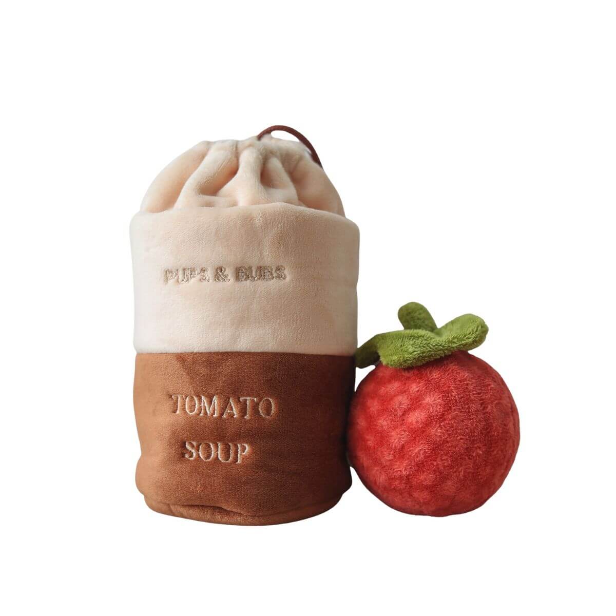 Pups and Bubs Tomato Soup Nosework Toy against a white background.