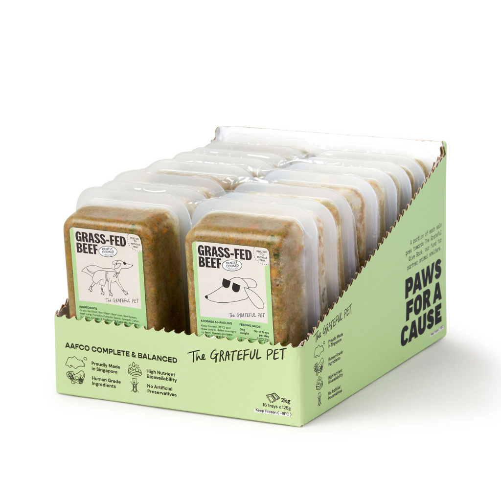 Packaging of grass-fed beef for pets with visible branding on a white background