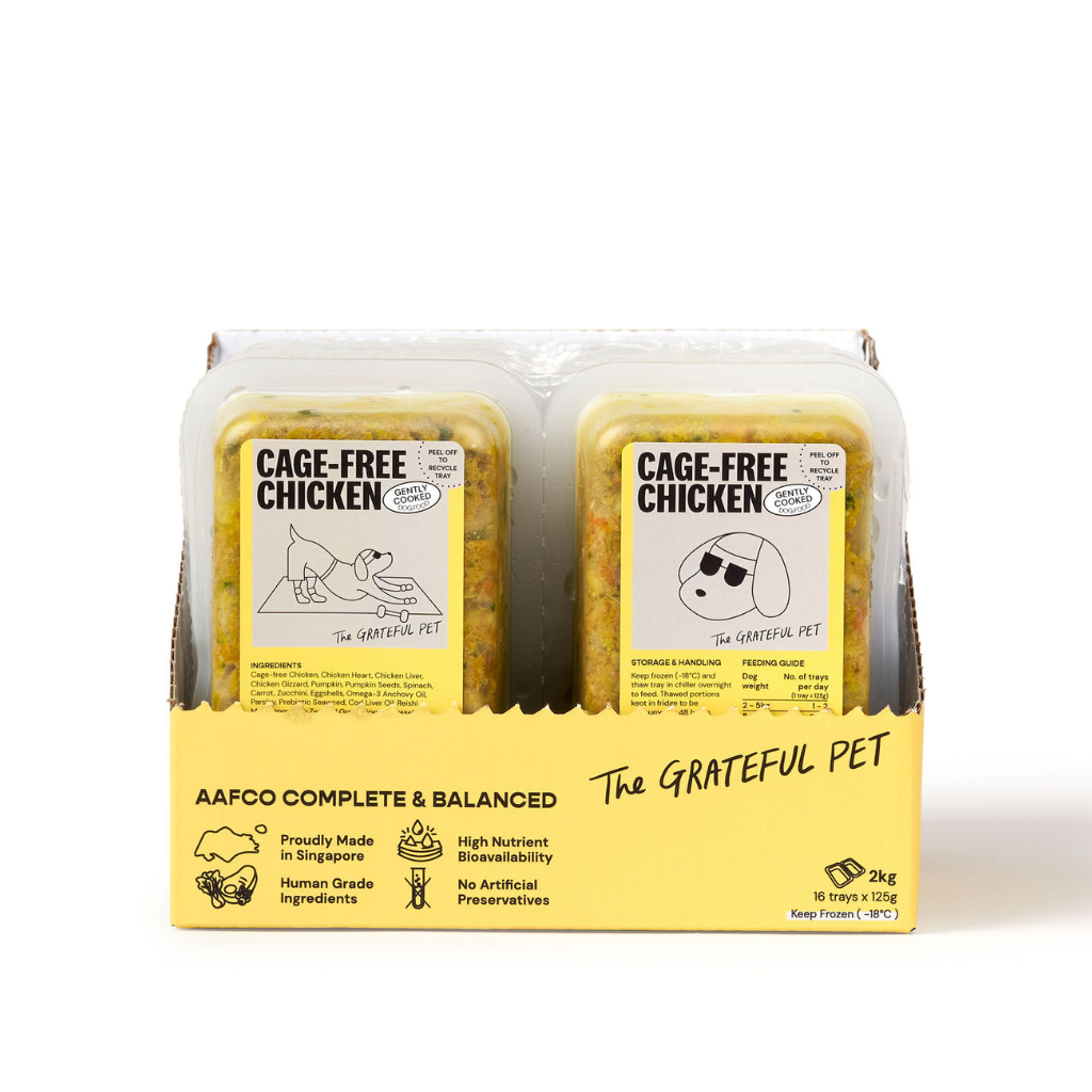 Pack of 'Cage-Free Chicken' pet food from 'The Grateful Pet' on a white background