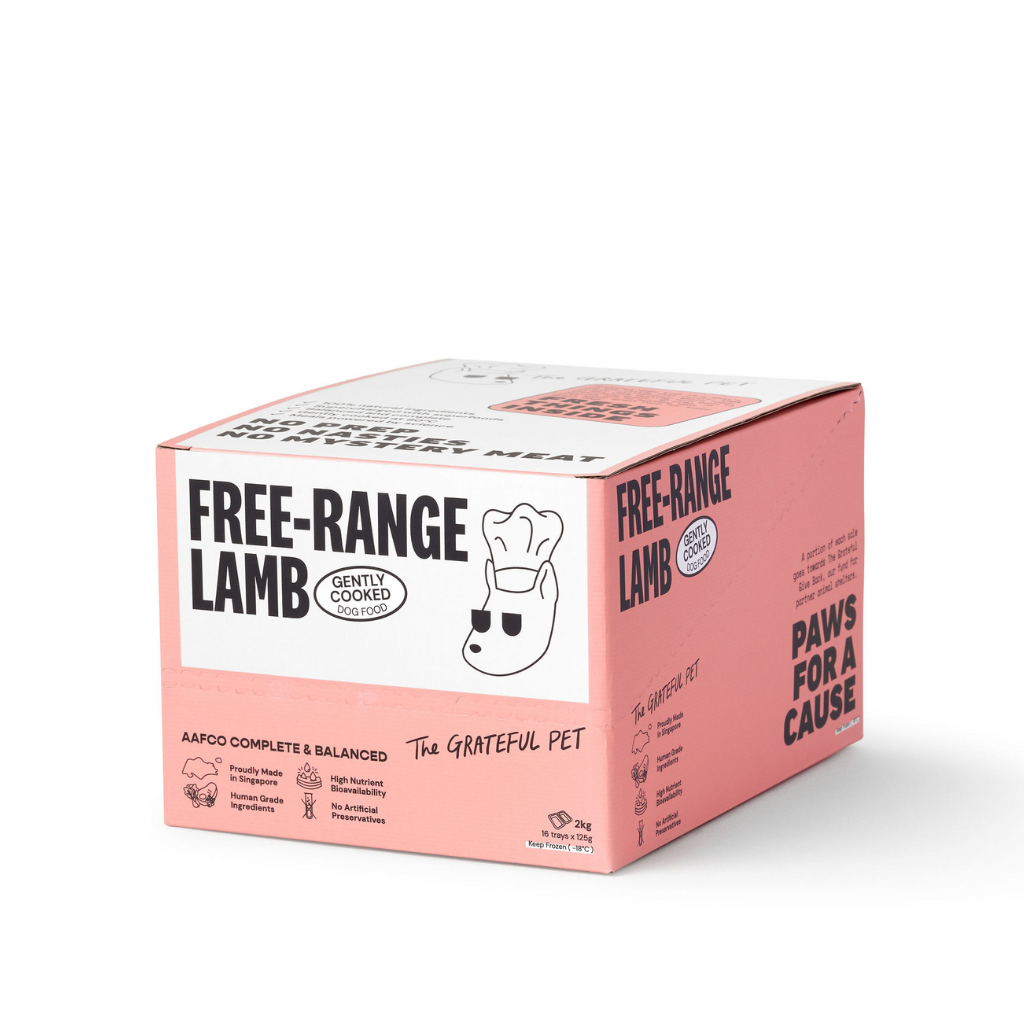 Pink pet food box labeled 'Free-Range Lamb' on a white background