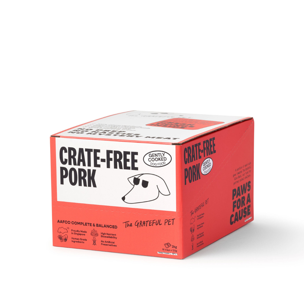 Box of 'Crate-Free Pork' pet food with branding and text on a white background