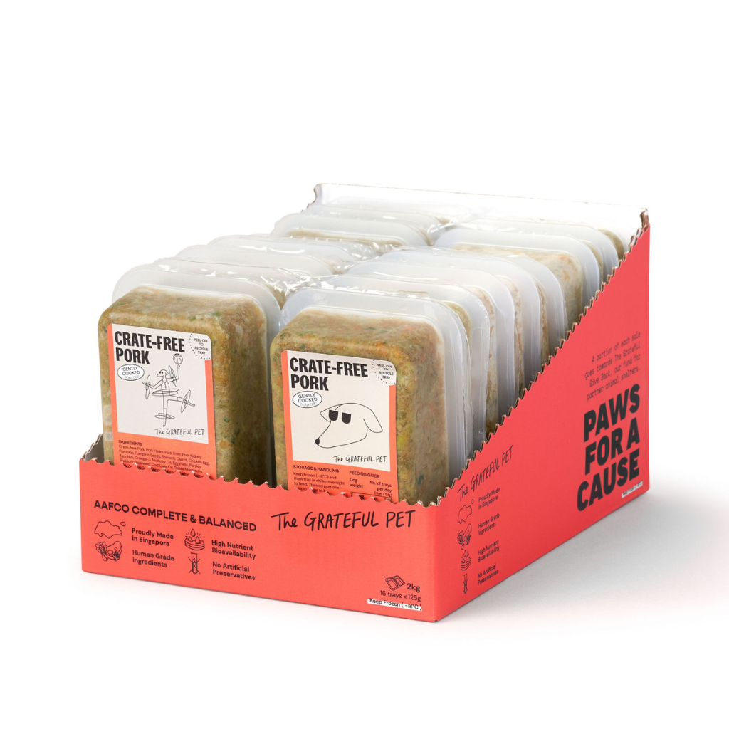Packaged pet food with 'The Grateful Pet' branding on a white background