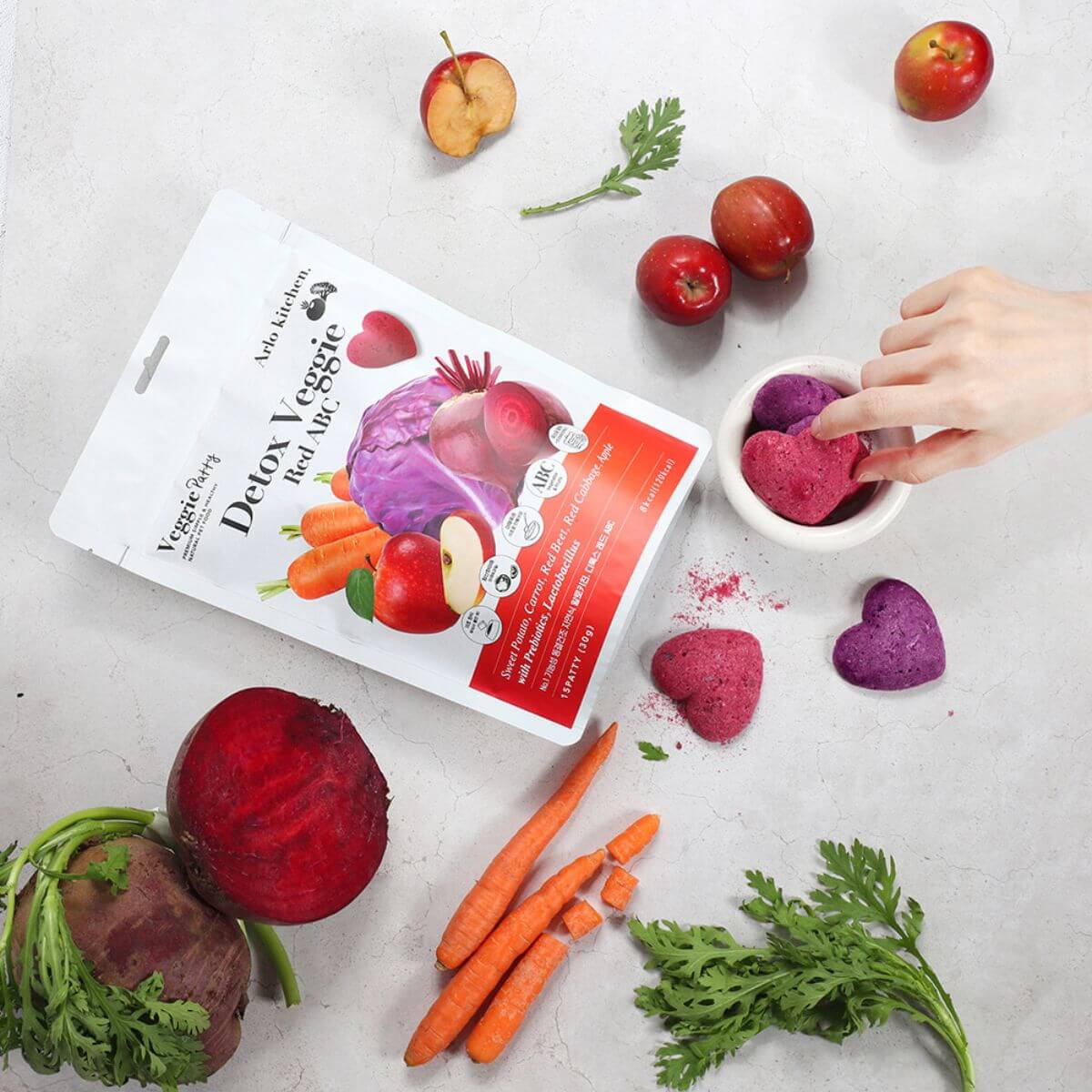 Arlo Kitchen Detox Red ABC Veggie Patties with its ingredients around it.