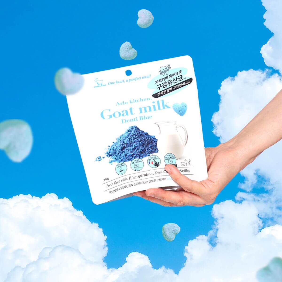 Arlo Kitchen Goat Milk Denti Blue Treats against a blue background.