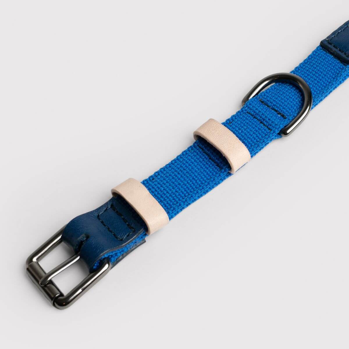 Masimalo collar in navy grandala blue against a white background.