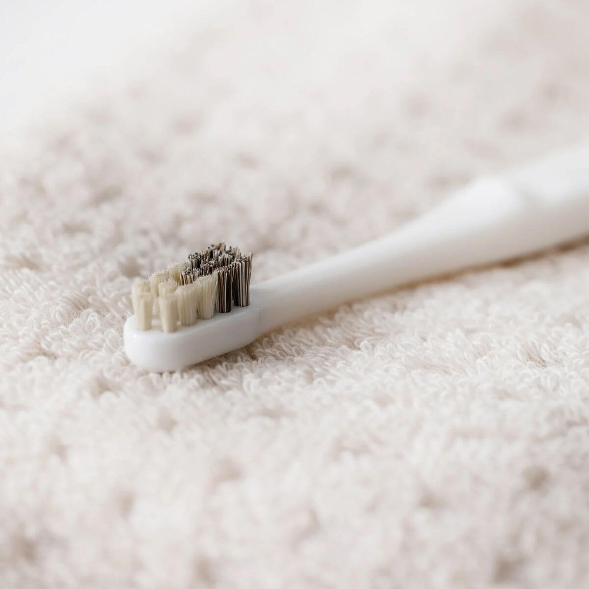 MIGAKENDE Goat and Horse Hair Slanted Toothbrush against a white background.