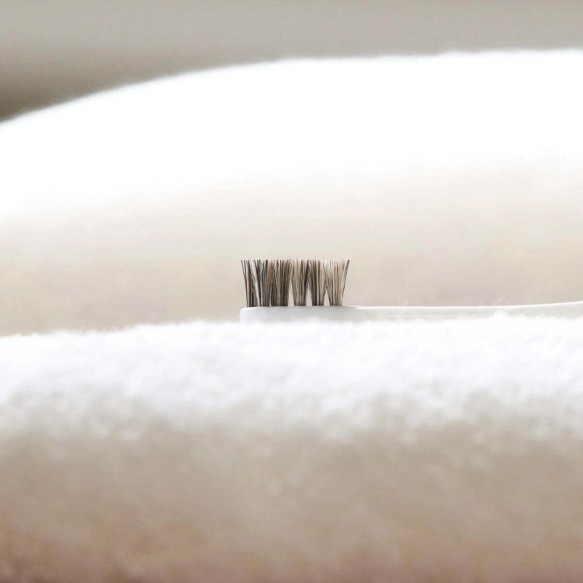 MIGAKENDE Horse Hair Bristle Toothbrush against a white background.