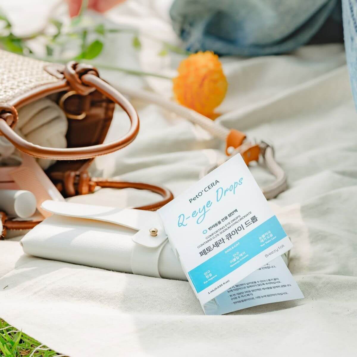  PetO'Cera Q Eye Drops on a picnic mat.