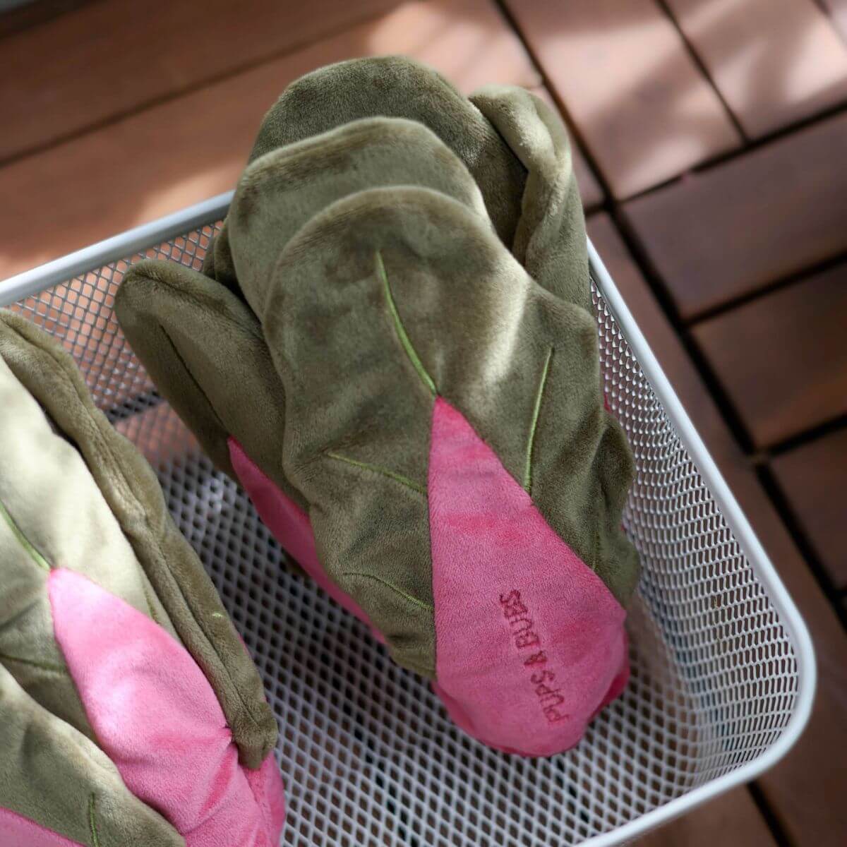 Pups & Bubs Snuffle Swiss Chard Nosework Toy in a basket.