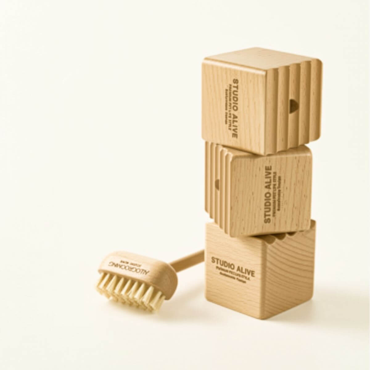 Studio Alive Allo Grooming Brush against a white background.