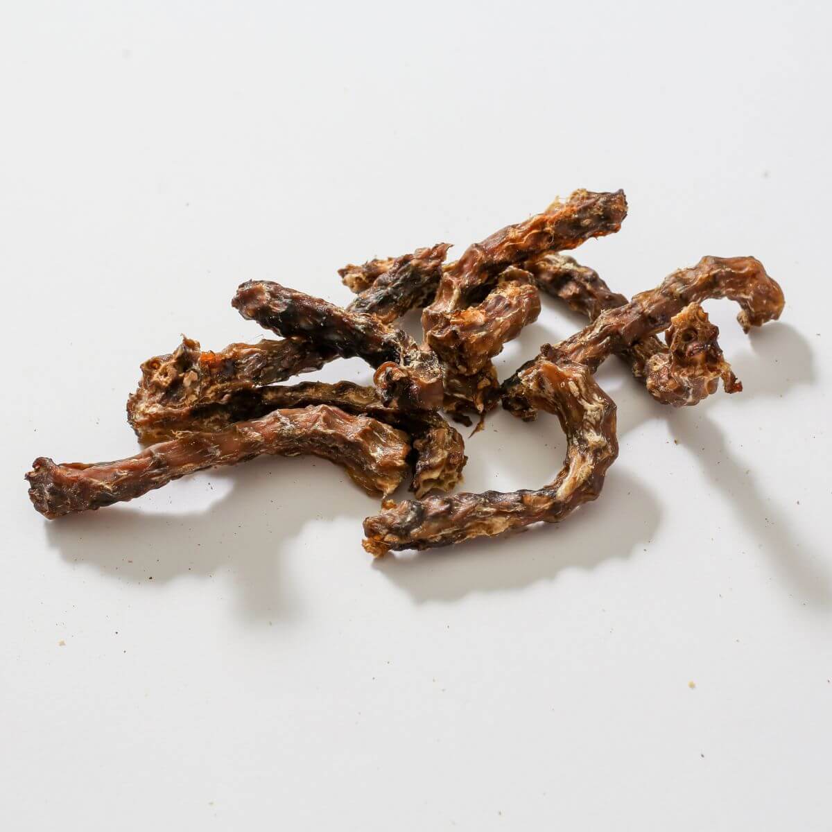 taki pets x naaf chicken necks short against a white background.