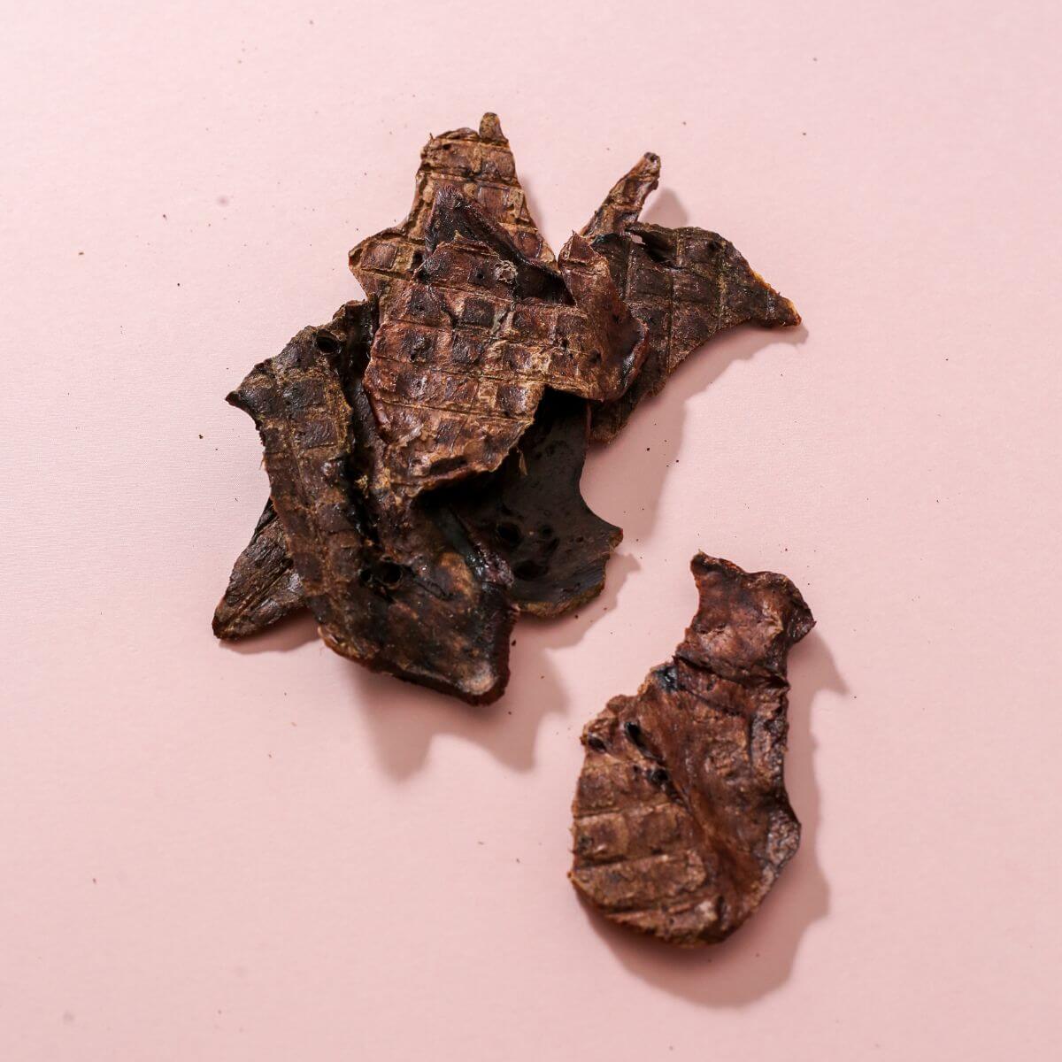 taki pets x naaf horse lung fuwa against a pink background.