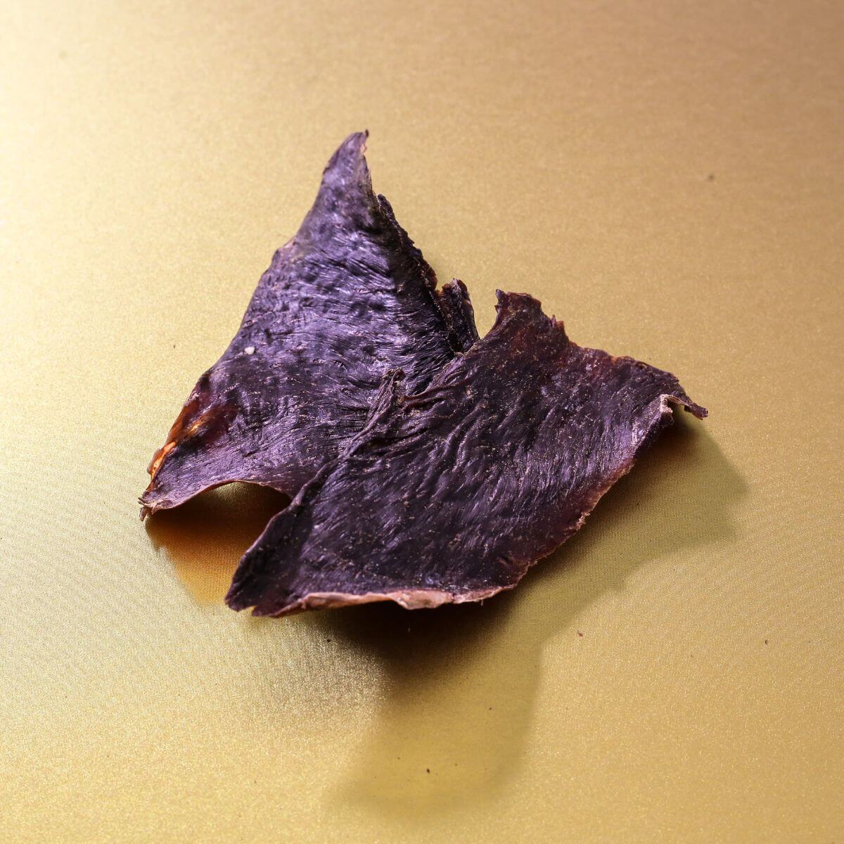 taki pets x naaf wagyu heart (hatsu) against a yellow / gold background.