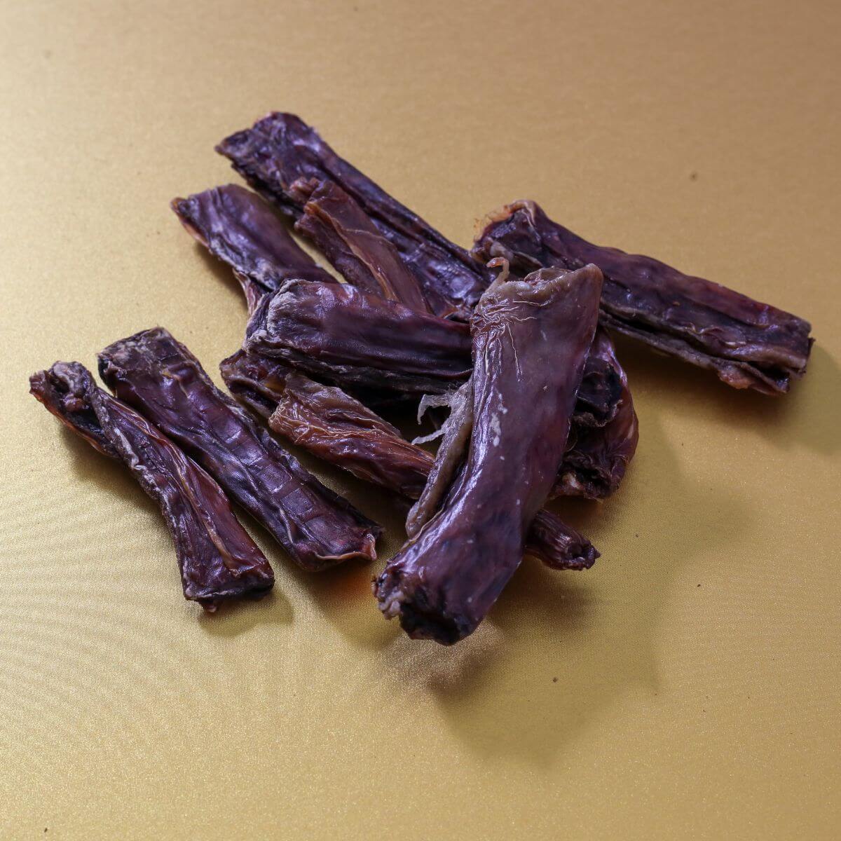 taki pets naaf wagyu oesophagus against a yellow background.