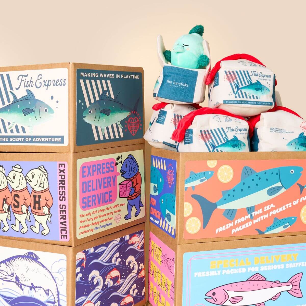 the furryfolks fish express nosework toy on top of cardboard boxes.